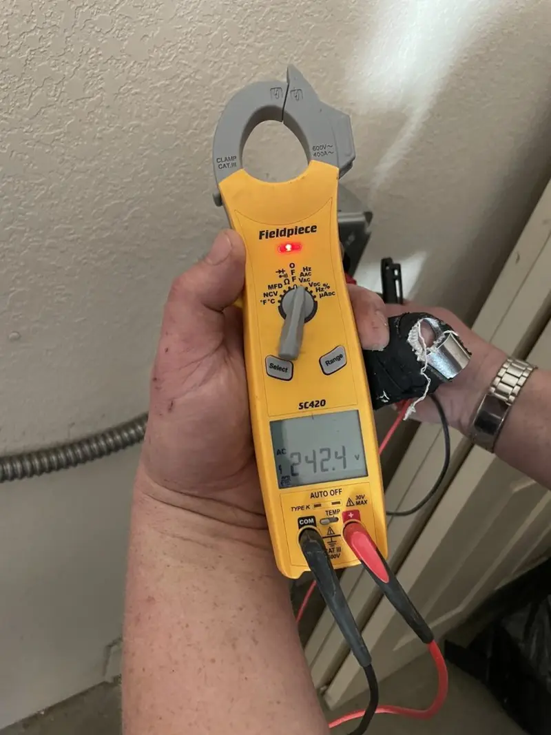Voltage testing with clamp meter during Generator Installation in Wilson